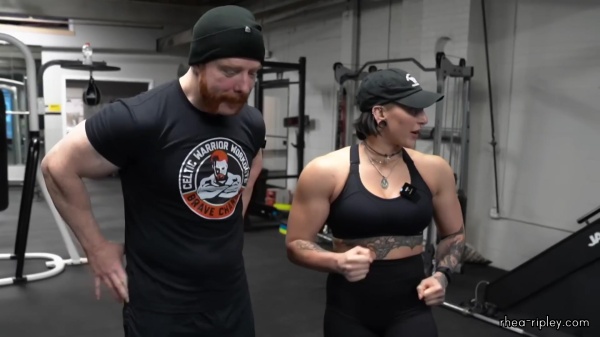 Rhea_Ripley_flexes_on_Sheamus_with_her__Nightmare__Arms_workout_4965.jpg