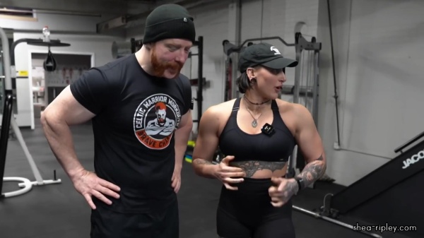 Rhea_Ripley_flexes_on_Sheamus_with_her__Nightmare__Arms_workout_4967.jpg