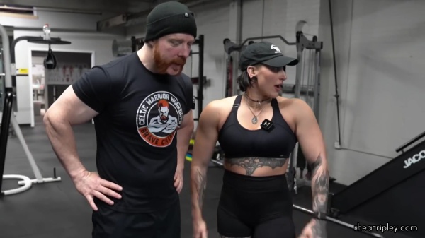 Rhea_Ripley_flexes_on_Sheamus_with_her__Nightmare__Arms_workout_4968.jpg