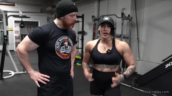 Rhea_Ripley_flexes_on_Sheamus_with_her__Nightmare__Arms_workout_4970.jpg