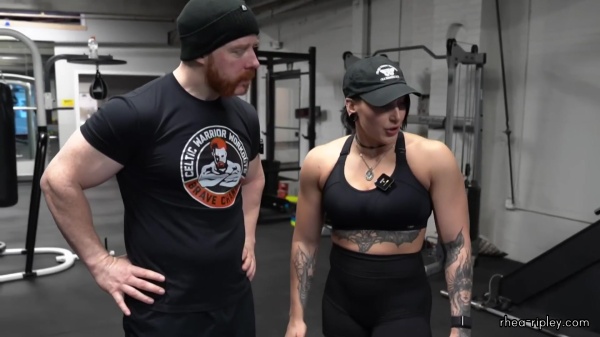 Rhea_Ripley_flexes_on_Sheamus_with_her__Nightmare__Arms_workout_4974.jpg