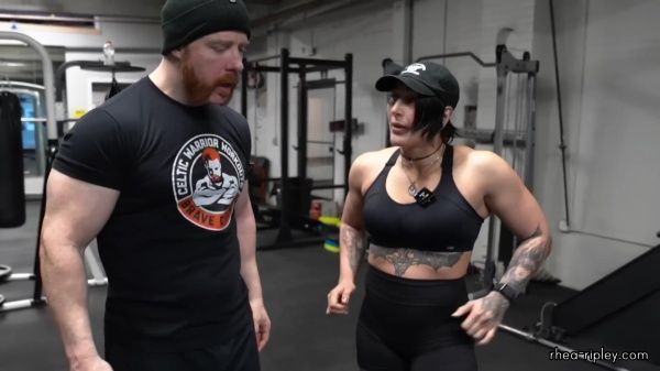 Rhea_Ripley_flexes_on_Sheamus_with_her__Nightmare__Arms_workout_4980.jpg