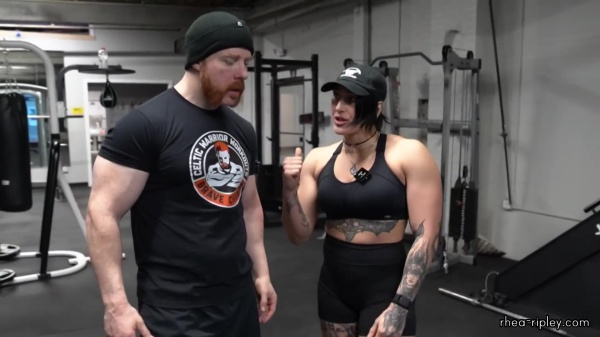 Rhea_Ripley_flexes_on_Sheamus_with_her__Nightmare__Arms_workout_4982.jpg