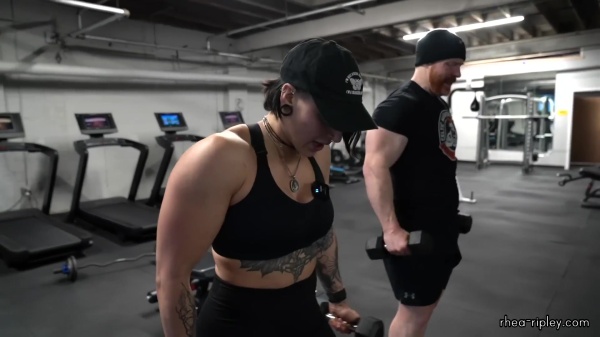 Rhea_Ripley_flexes_on_Sheamus_with_her__Nightmare__Arms_workout_5305.jpg
