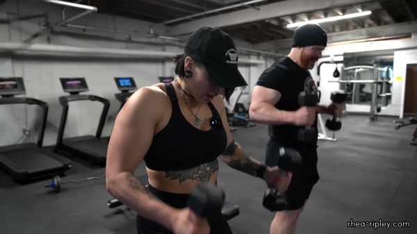 Rhea_Ripley_flexes_on_Sheamus_with_her__Nightmare__Arms_workout_5306.jpg