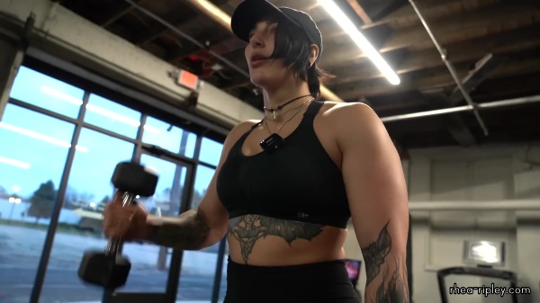 Rhea_Ripley_flexes_on_Sheamus_with_her__Nightmare__Arms_workout_5340.jpg