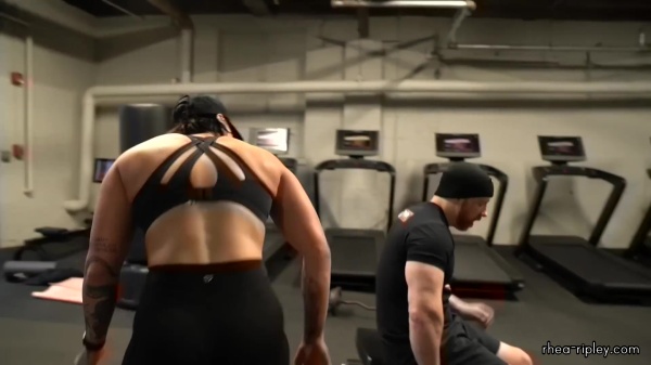 Rhea_Ripley_flexes_on_Sheamus_with_her__Nightmare__Arms_workout_5378.jpg