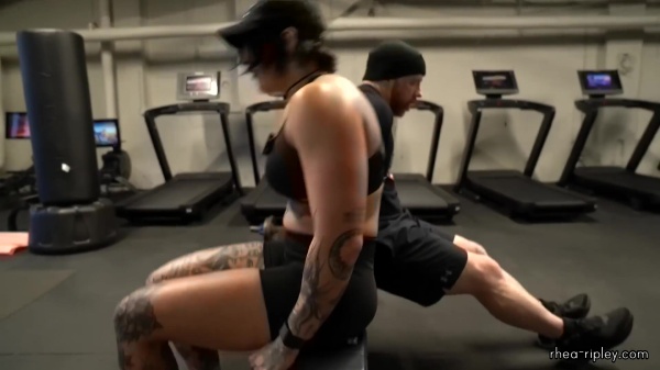 Rhea_Ripley_flexes_on_Sheamus_with_her__Nightmare__Arms_workout_5381.jpg