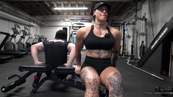 Rhea_Ripley_flexes_on_Sheamus_with_her__Nightmare__Arms_workout_5412.jpg