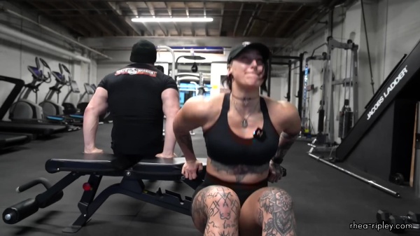 Rhea_Ripley_flexes_on_Sheamus_with_her__Nightmare__Arms_workout_5413.jpg