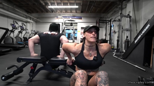 Rhea_Ripley_flexes_on_Sheamus_with_her__Nightmare__Arms_workout_5414.jpg