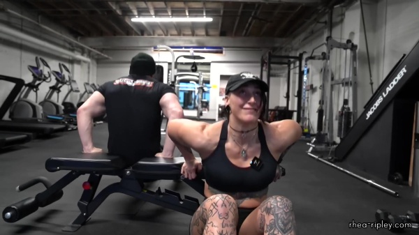 Rhea_Ripley_flexes_on_Sheamus_with_her__Nightmare__Arms_workout_5417.jpg