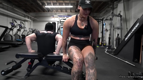 Rhea_Ripley_flexes_on_Sheamus_with_her__Nightmare__Arms_workout_5419.jpg