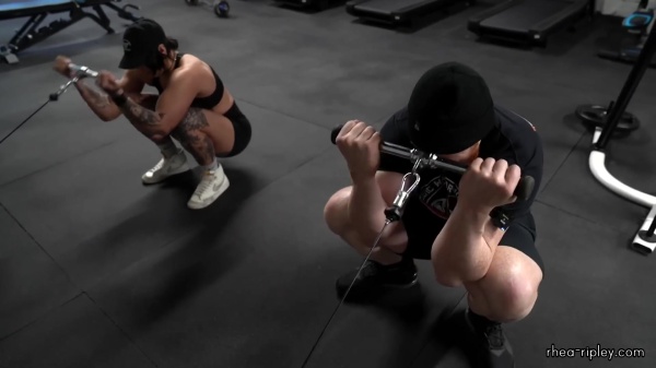 Rhea_Ripley_flexes_on_Sheamus_with_her__Nightmare__Arms_workout_5469.jpg