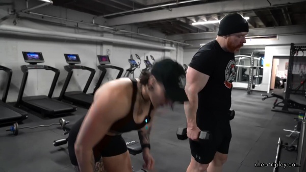 Rhea_Ripley_flexes_on_Sheamus_with_her__Nightmare__Arms_workout_5525.jpg