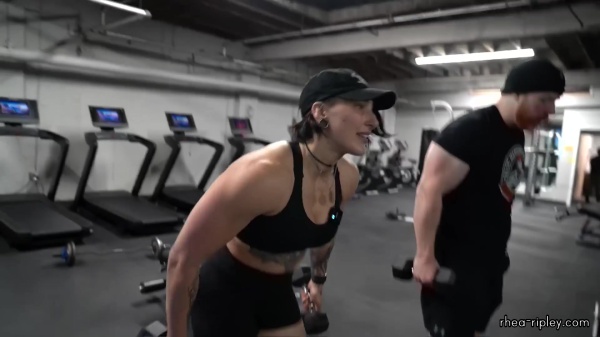 Rhea_Ripley_flexes_on_Sheamus_with_her__Nightmare__Arms_workout_5530.jpg