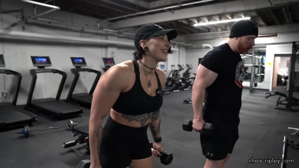 Rhea_Ripley_flexes_on_Sheamus_with_her__Nightmare__Arms_workout_5533.jpg