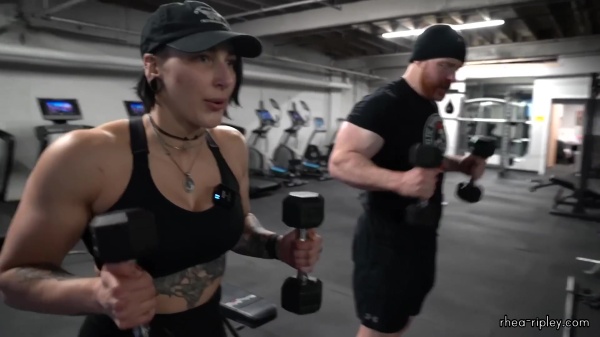 Rhea_Ripley_flexes_on_Sheamus_with_her__Nightmare__Arms_workout_5539.jpg