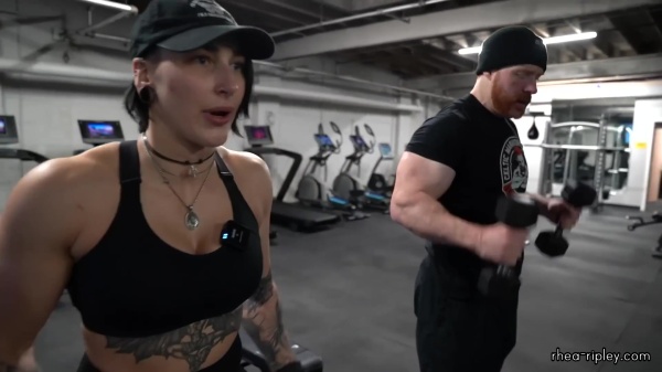 Rhea_Ripley_flexes_on_Sheamus_with_her__Nightmare__Arms_workout_5540.jpg