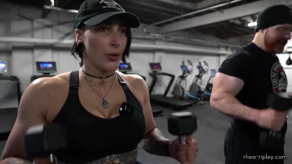 Rhea_Ripley_flexes_on_Sheamus_with_her__Nightmare__Arms_workout_5542.jpg