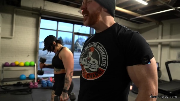 Rhea_Ripley_flexes_on_Sheamus_with_her__Nightmare__Arms_workout_5551.jpg
