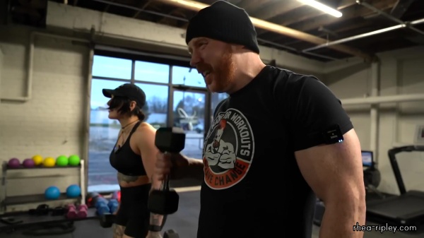 Rhea_Ripley_flexes_on_Sheamus_with_her__Nightmare__Arms_workout_5556.jpg
