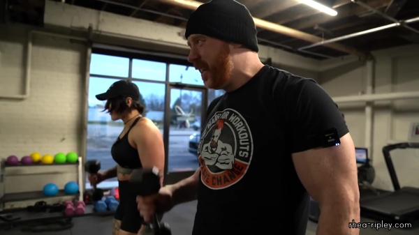 Rhea_Ripley_flexes_on_Sheamus_with_her__Nightmare__Arms_workout_5557.jpg