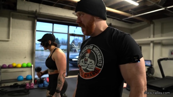 Rhea_Ripley_flexes_on_Sheamus_with_her__Nightmare__Arms_workout_5558.jpg