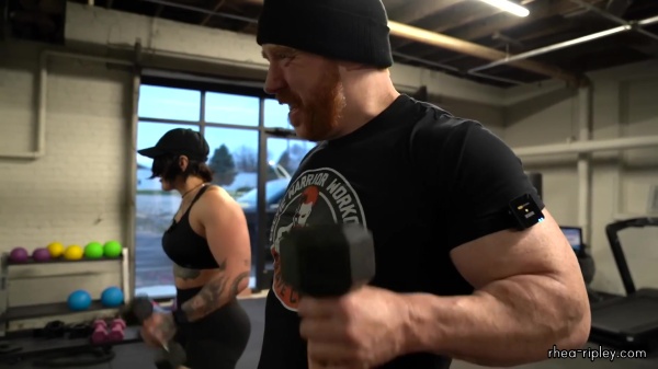 Rhea_Ripley_flexes_on_Sheamus_with_her__Nightmare__Arms_workout_5560.jpg