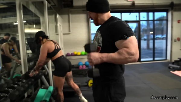 Rhea_Ripley_flexes_on_Sheamus_with_her__Nightmare__Arms_workout_5567.jpg