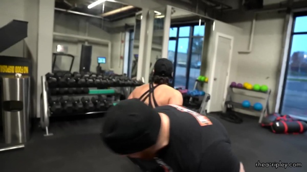 Rhea_Ripley_flexes_on_Sheamus_with_her__Nightmare__Arms_workout_5590.jpg