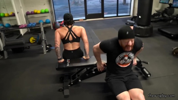 Rhea_Ripley_flexes_on_Sheamus_with_her__Nightmare__Arms_workout_5607.jpg