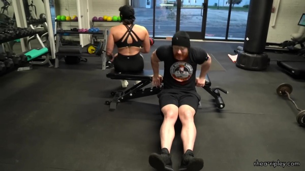 Rhea_Ripley_flexes_on_Sheamus_with_her__Nightmare__Arms_workout_5617.jpg