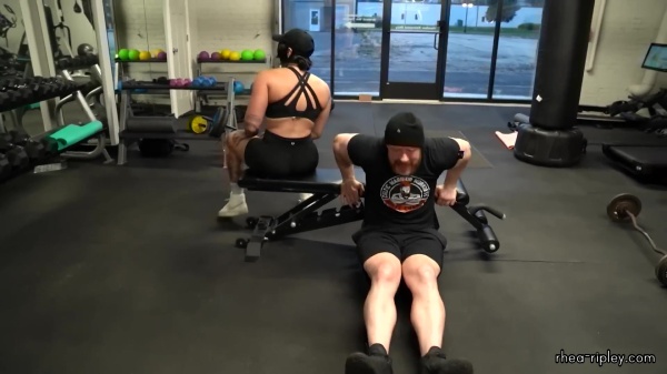 Rhea_Ripley_flexes_on_Sheamus_with_her__Nightmare__Arms_workout_5618.jpg