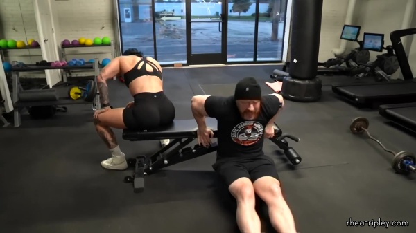 Rhea_Ripley_flexes_on_Sheamus_with_her__Nightmare__Arms_workout_5621.jpg