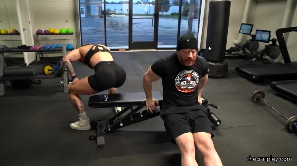 Rhea_Ripley_flexes_on_Sheamus_with_her__Nightmare__Arms_workout_5622.jpg
