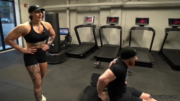 Rhea_Ripley_flexes_on_Sheamus_with_her__Nightmare__Arms_workout_5632.jpg