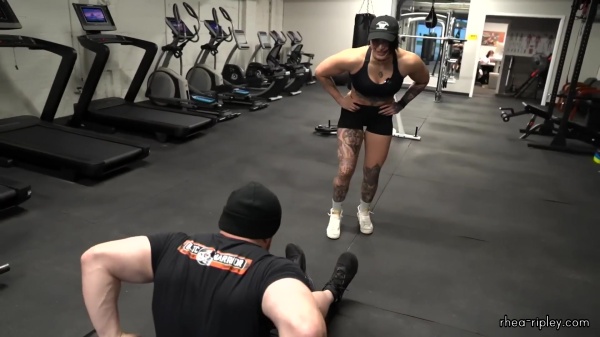 Rhea_Ripley_flexes_on_Sheamus_with_her__Nightmare__Arms_workout_5650.jpg