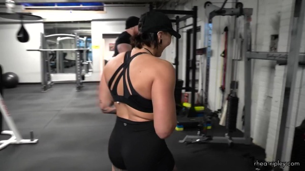 Rhea_Ripley_flexes_on_Sheamus_with_her__Nightmare__Arms_workout_5688.jpg