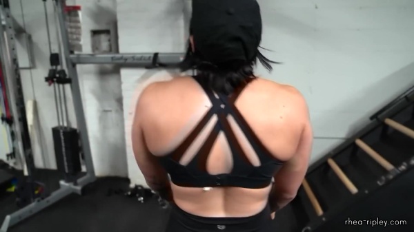 Rhea_Ripley_flexes_on_Sheamus_with_her__Nightmare__Arms_workout_5745.jpg