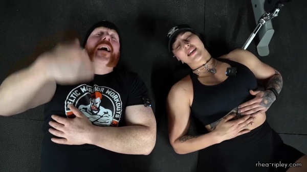 Rhea_Ripley_flexes_on_Sheamus_with_her__Nightmare__Arms_workout_5770.jpg
