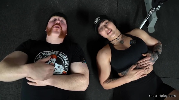 Rhea_Ripley_flexes_on_Sheamus_with_her__Nightmare__Arms_workout_5771.jpg