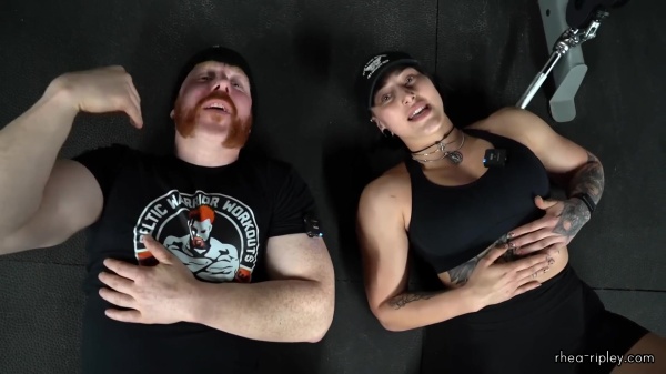 Rhea_Ripley_flexes_on_Sheamus_with_her__Nightmare__Arms_workout_5774.jpg
