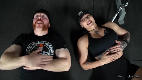 Rhea_Ripley_flexes_on_Sheamus_with_her__Nightmare__Arms_workout_5778.jpg