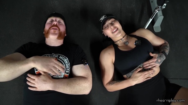 Rhea_Ripley_flexes_on_Sheamus_with_her__Nightmare__Arms_workout_5780.jpg