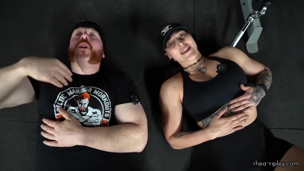 Rhea_Ripley_flexes_on_Sheamus_with_her__Nightmare__Arms_workout_5782.jpg