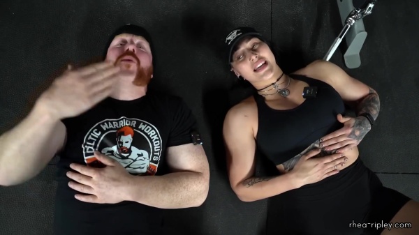 Rhea_Ripley_flexes_on_Sheamus_with_her__Nightmare__Arms_workout_5791.jpg
