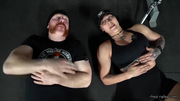 Rhea_Ripley_flexes_on_Sheamus_with_her__Nightmare__Arms_workout_5793.jpg