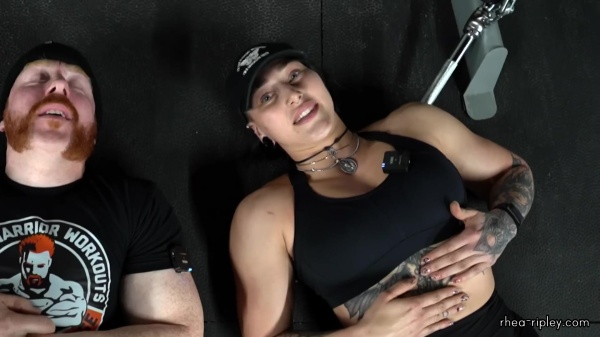 Rhea_Ripley_flexes_on_Sheamus_with_her__Nightmare__Arms_workout_5795.jpg