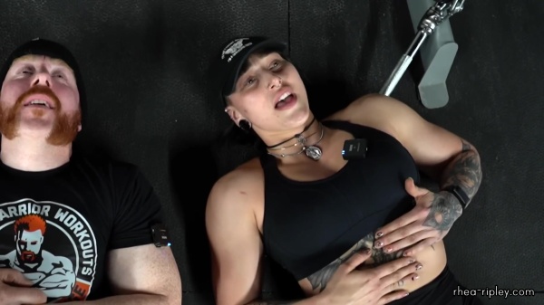 Rhea_Ripley_flexes_on_Sheamus_with_her__Nightmare__Arms_workout_5806.jpg